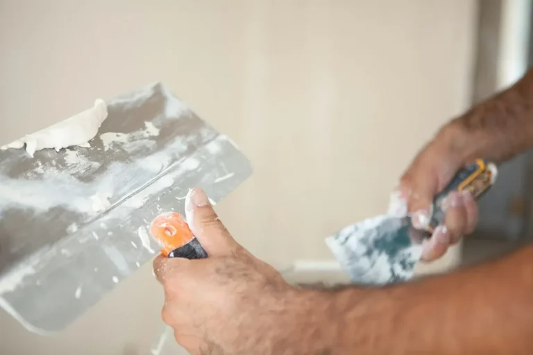 Drywall patching and surface preparation