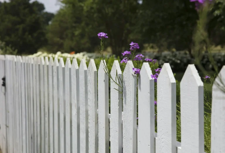 White picket fence in a garden